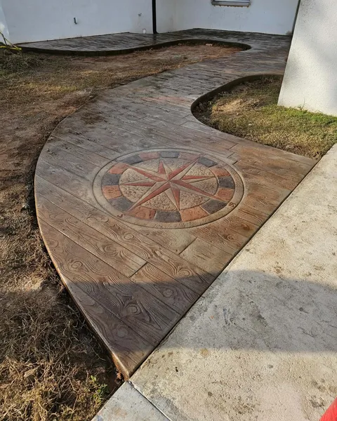 Wood-plank stamped walkway with compass medallion